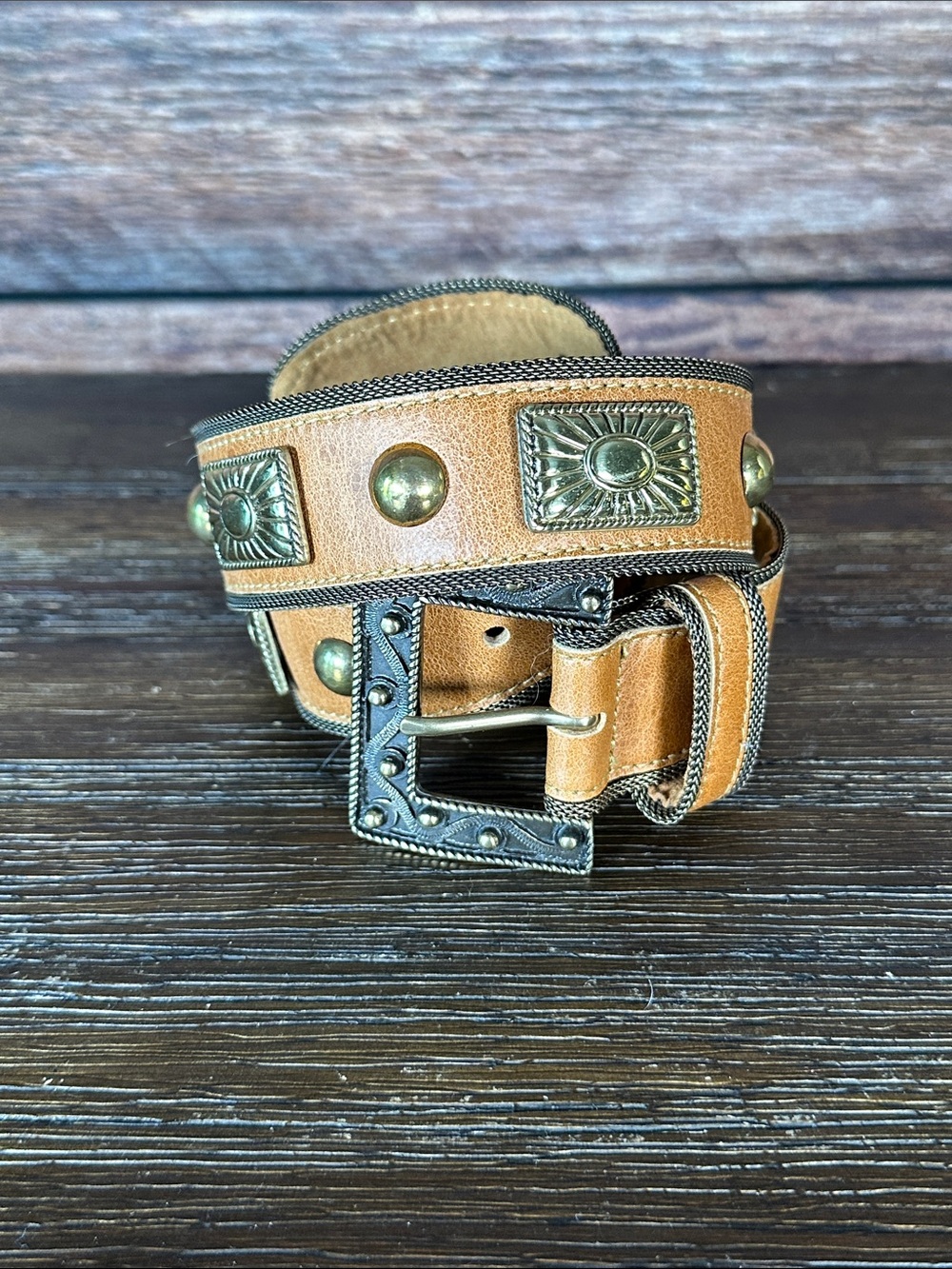 Streets Ahead women’s tan belt with stunning gold accents!